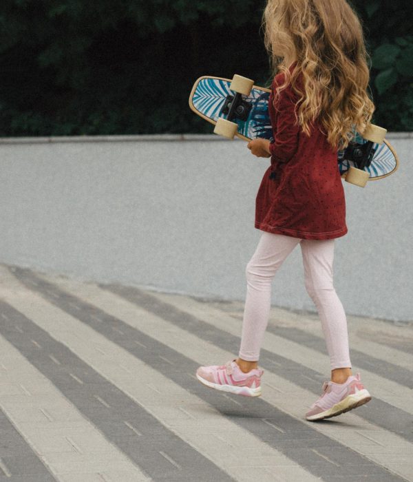Little girl with skateboard